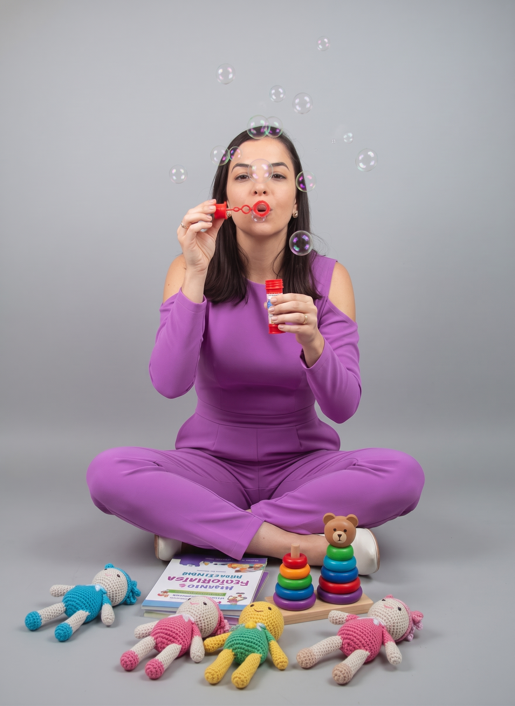 Dra. Camila Costa brincando com brinquedos educativos